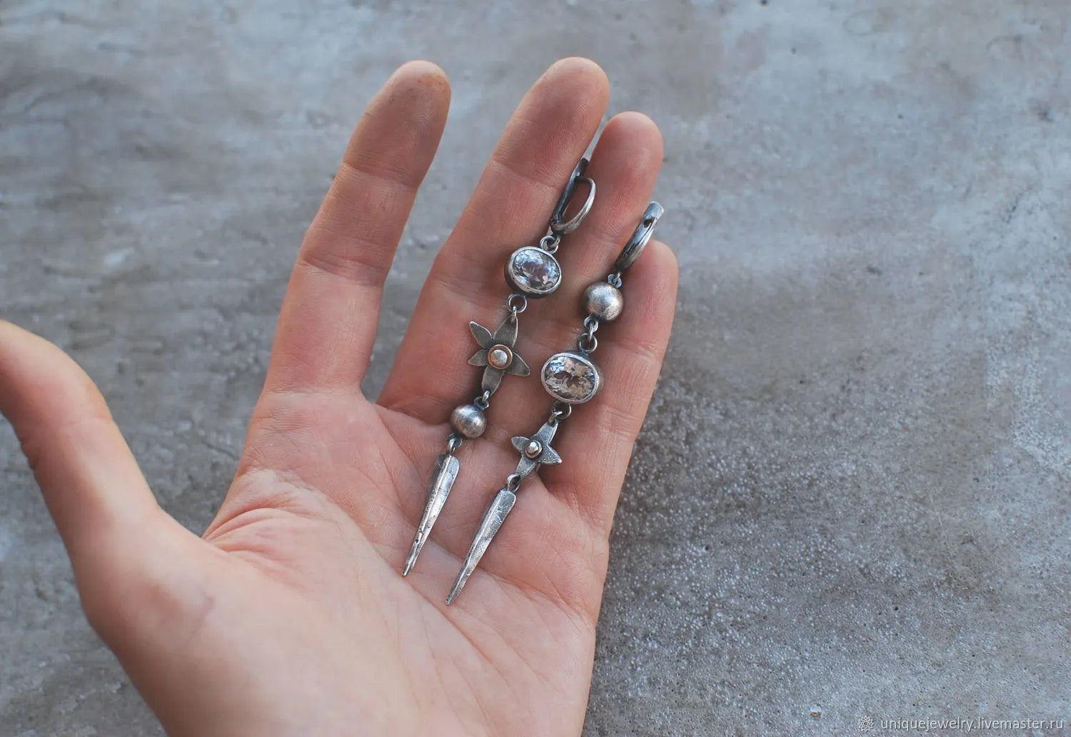 Geometric antique silver pendant earrings with XINGX design and rhinestone detailing