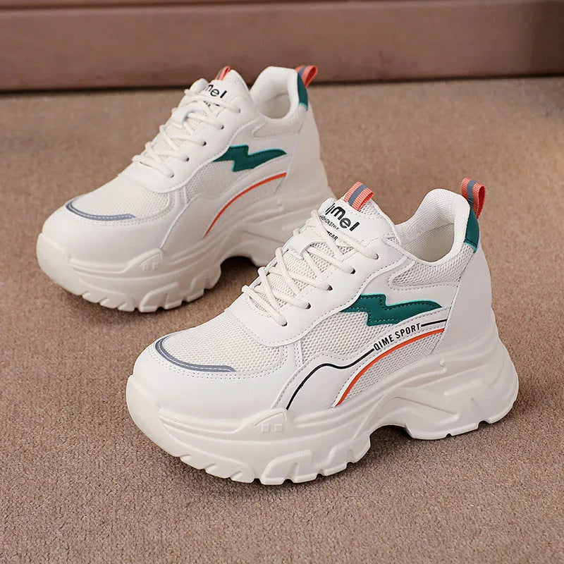 White women's dad shoes with cross shoulder straps, lace-up front, and a breathable mesh upper.