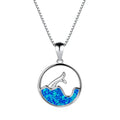Geometric fishtail pendant necklace with a round blue opal stone on an adjustable silver-tone chain.