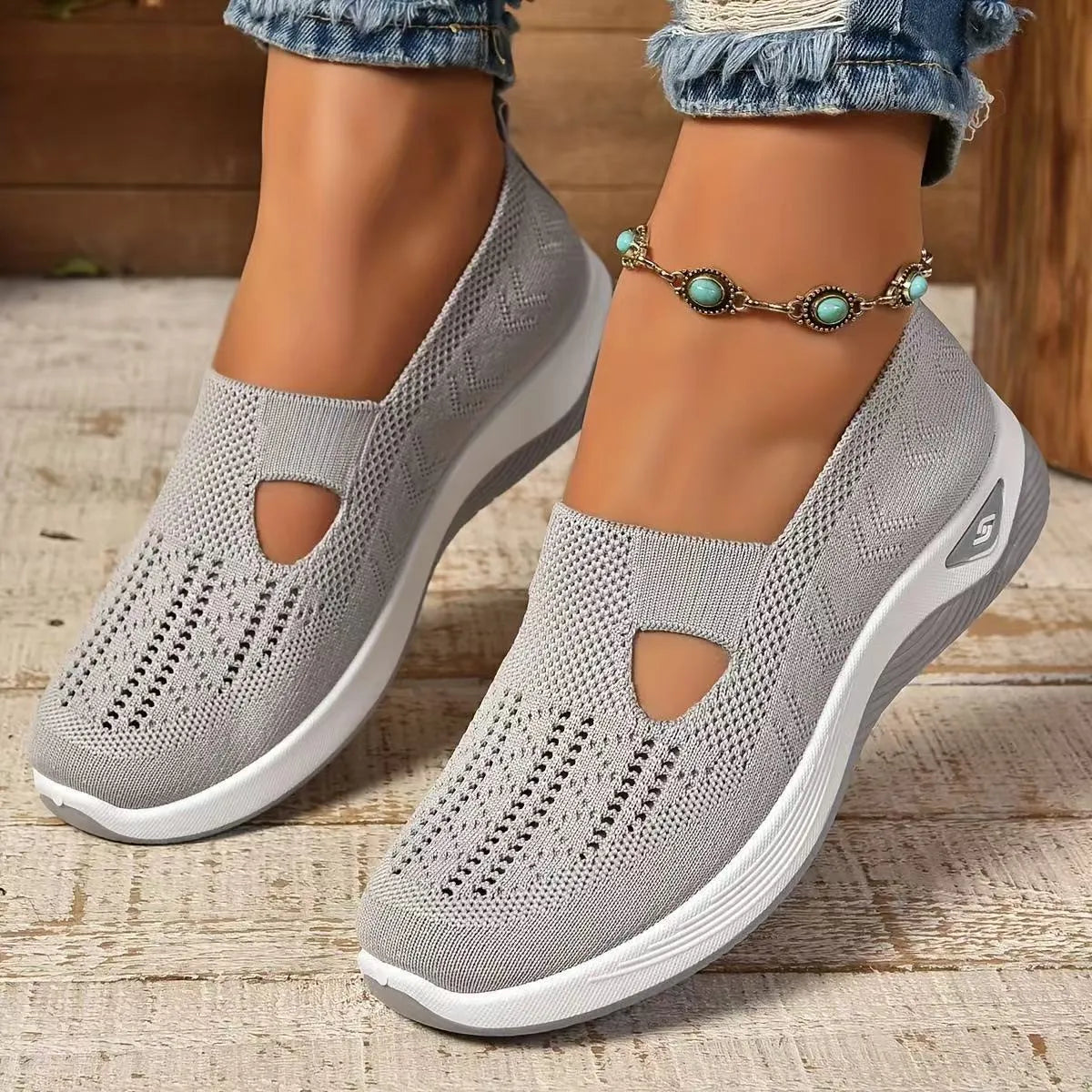 Women's casual low-top mesh shoes with a T-strap and soft PVC sole in multiple colours.