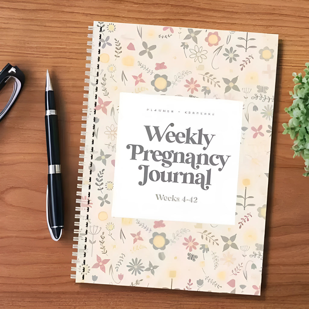 A5 pregnancy weekly diary notebook open showing weekly tracking pages
