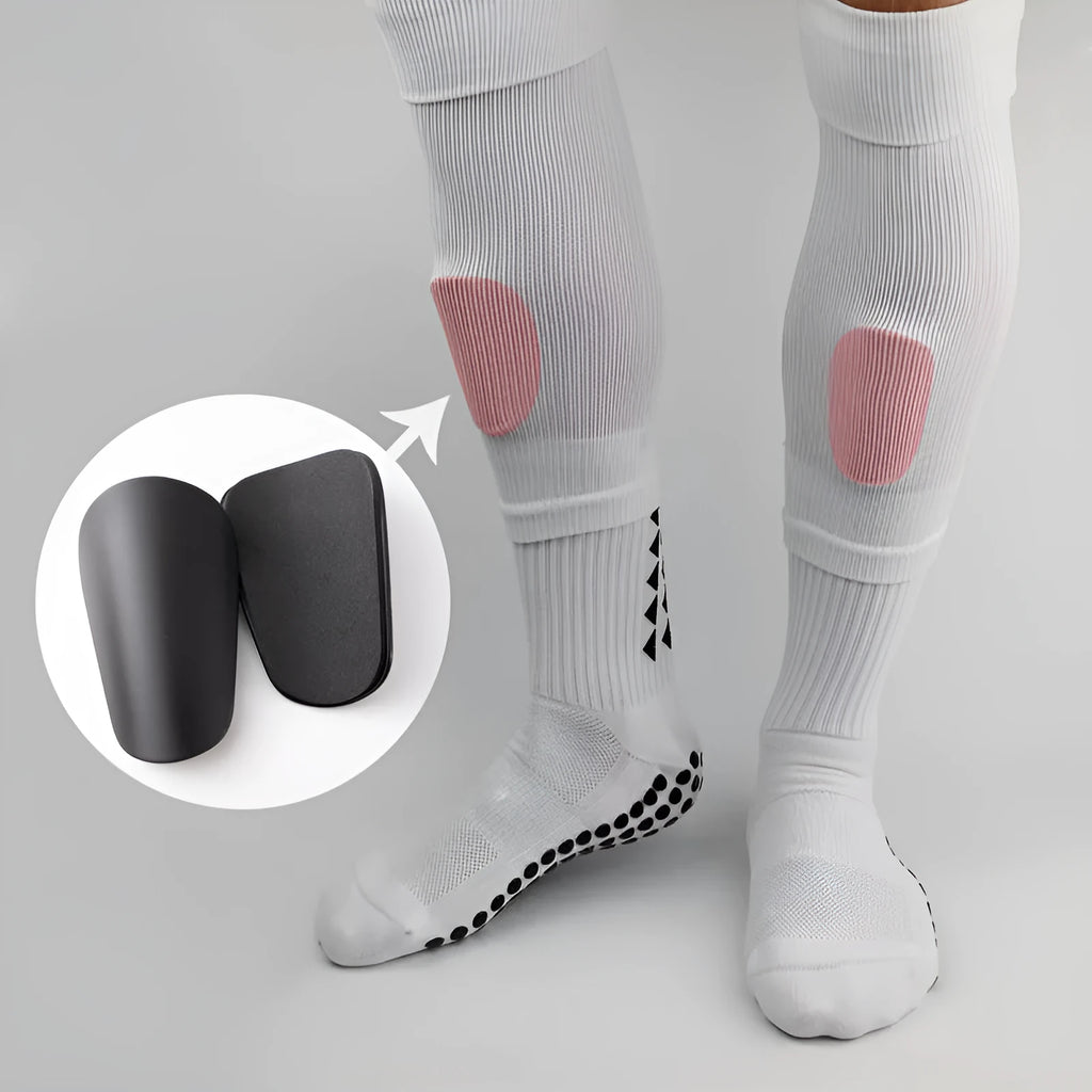 PU mini shin guards for football and sports protection in black, white, red, and blue colours.