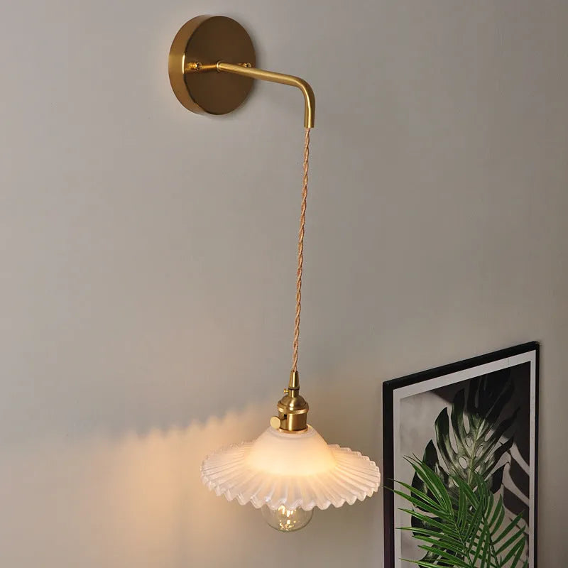 Retro brass lotus wall lamp with copper body and glass shade in 22cm diameter
