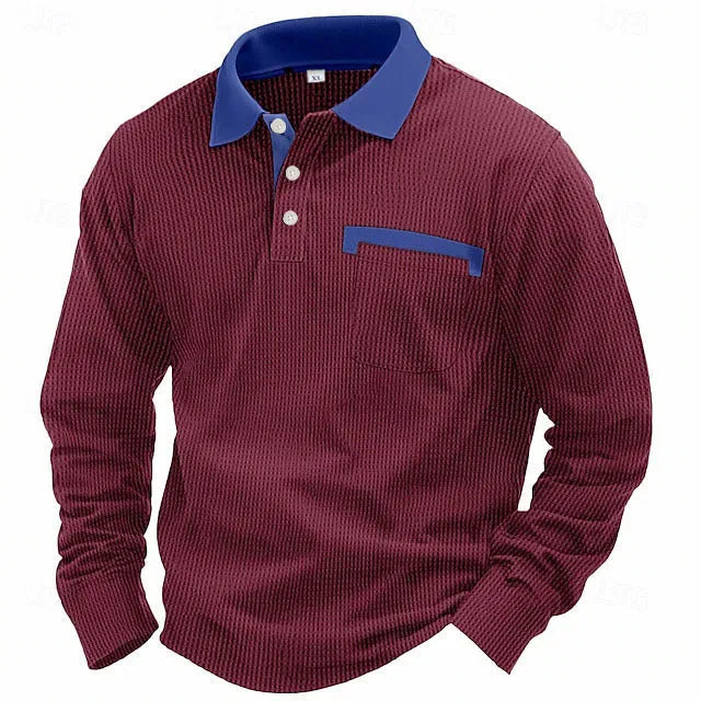 Man wearing a long-sleeved waffle-textured polo shirt in a loose fit with an asymmetric design detail.