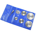 Set of six small high-speed steel circular saw blades and a mandrel for woodworking