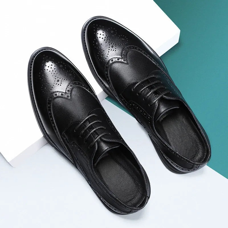 Men's black brogue leather shoes with traditional perforated detailing and lace-up design