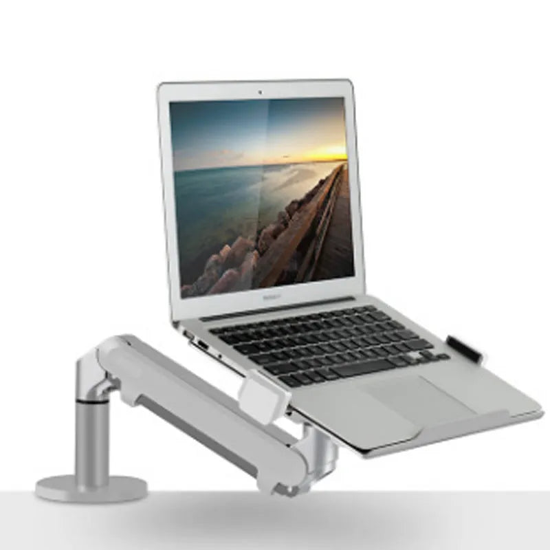 Silver aluminium alloy laptop stand with air pressure arm bracket on desktop