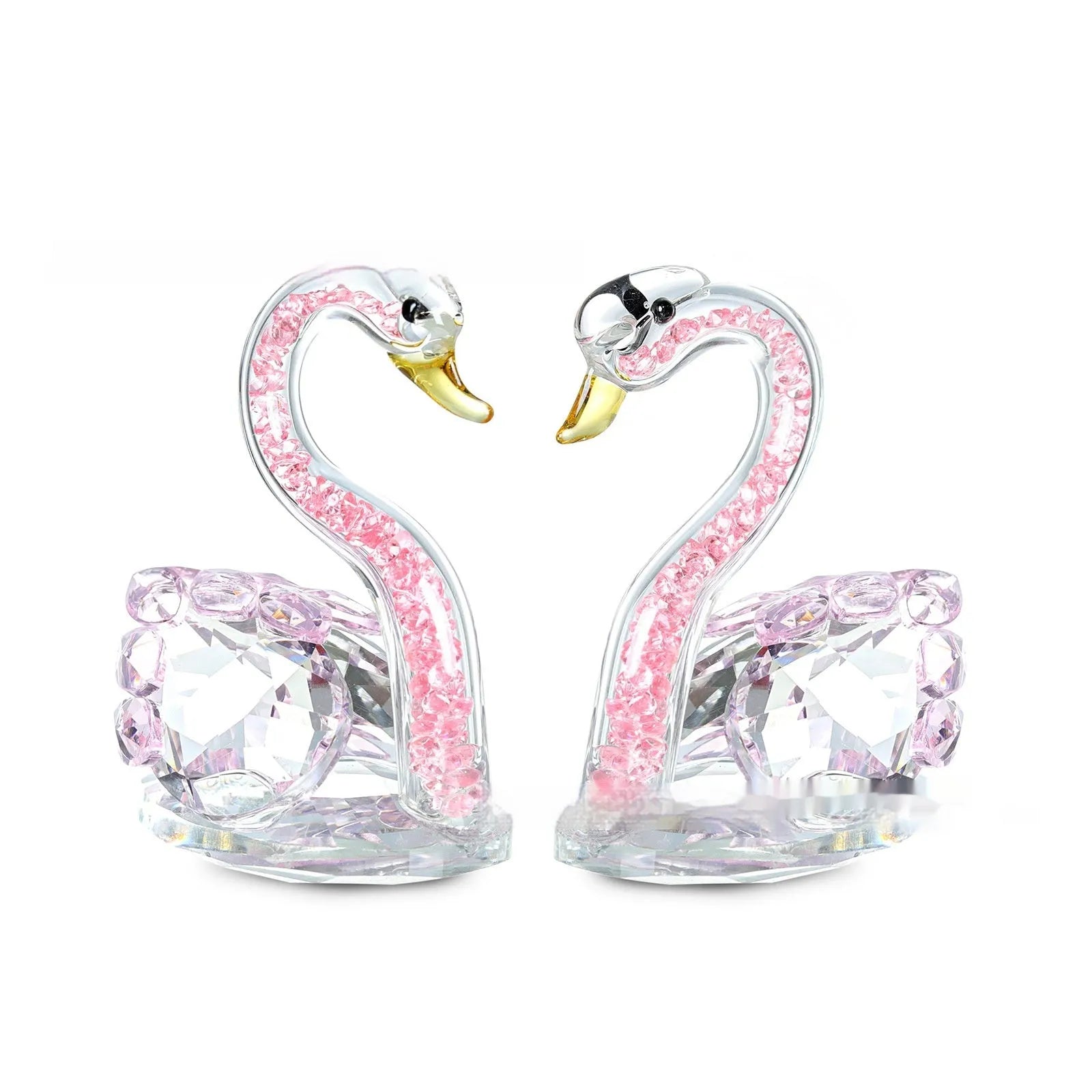 Crystal swan desktop ornament in red, blue, pink, or purple on a wooden surface.