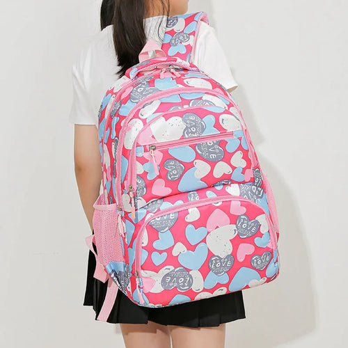 Blue children's school backpack with air pillow shoulder straps and Oxford cloth exterior