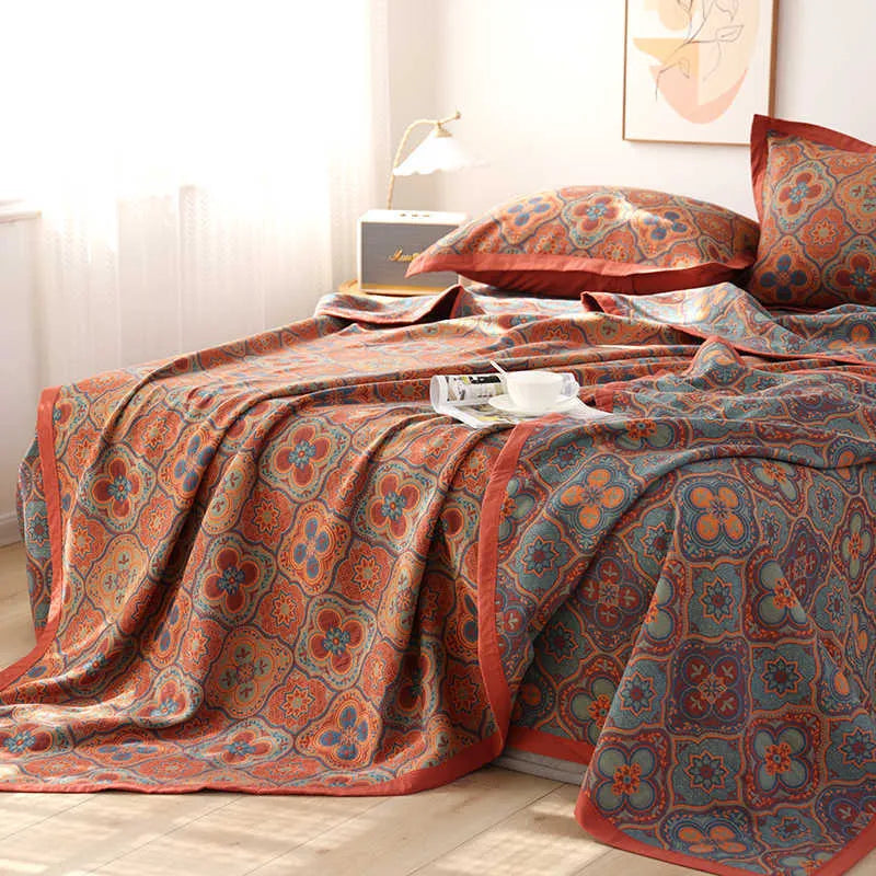 Cotton gauze bed blanket set with floral botanical pattern and two matching pillowcases