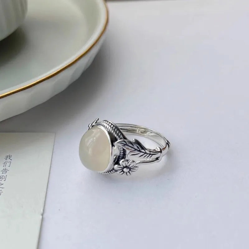 Adjustable copper vintage ring with white chalcedony style colour and U-shaped open mouth design