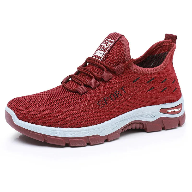 Men's and women's low-top casual sneakers with a round toe and soft PVC sole.