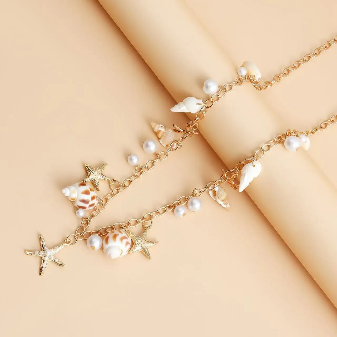 Women's waist chain and matching bracelet jewellery set with star motif design