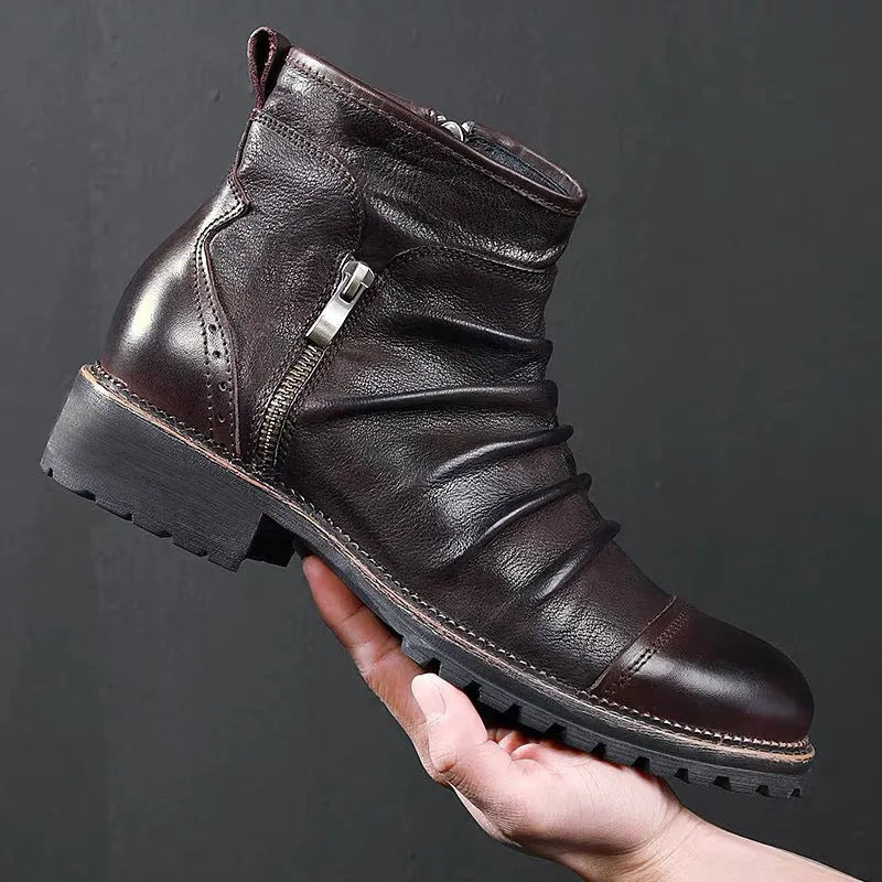 Brown mid-calf cowboy boots with a side zipper, round toe, and a medium horseshoe heel.