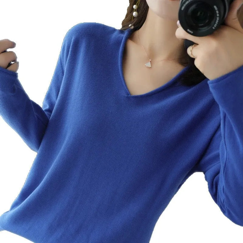 Women's long sleeve V-neck knitwear pullover top in a choice of ten colours on a hanger.