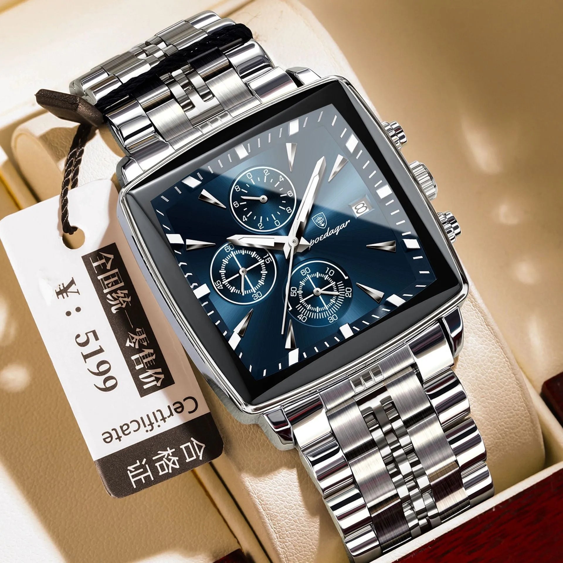 Square men's business watch with stainless steel strap showing gold case with blue dial colour option