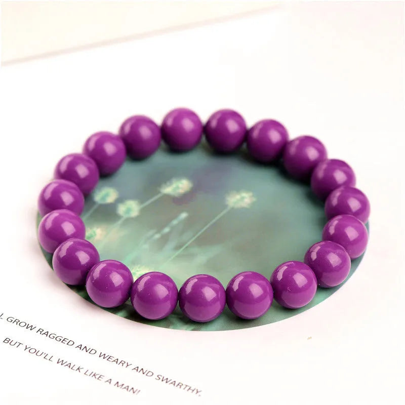 Jiuya purple crystal bracelet with polished beads showing three distinct size options