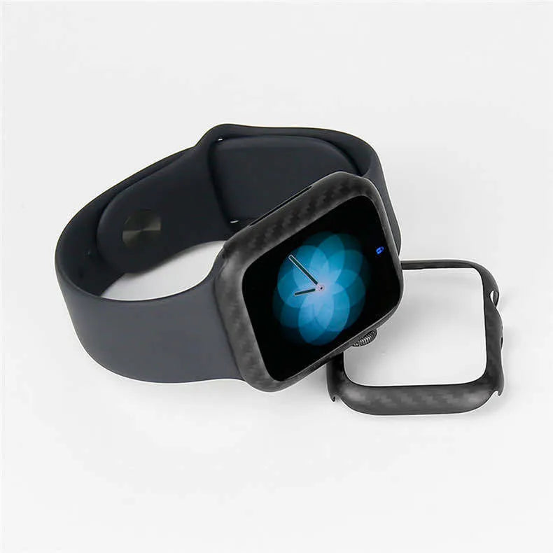 Ultra-thin black carbon fibre half-wrap case for a 44mm Apple Watch Series 4 on a leather band.
