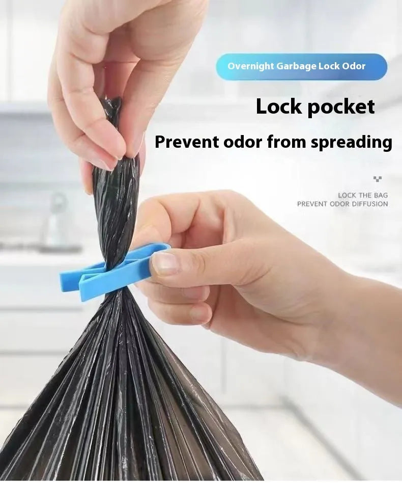 A white PP plastic clip designed to secure a bin bag to the side of a kitchen rubbish bin.