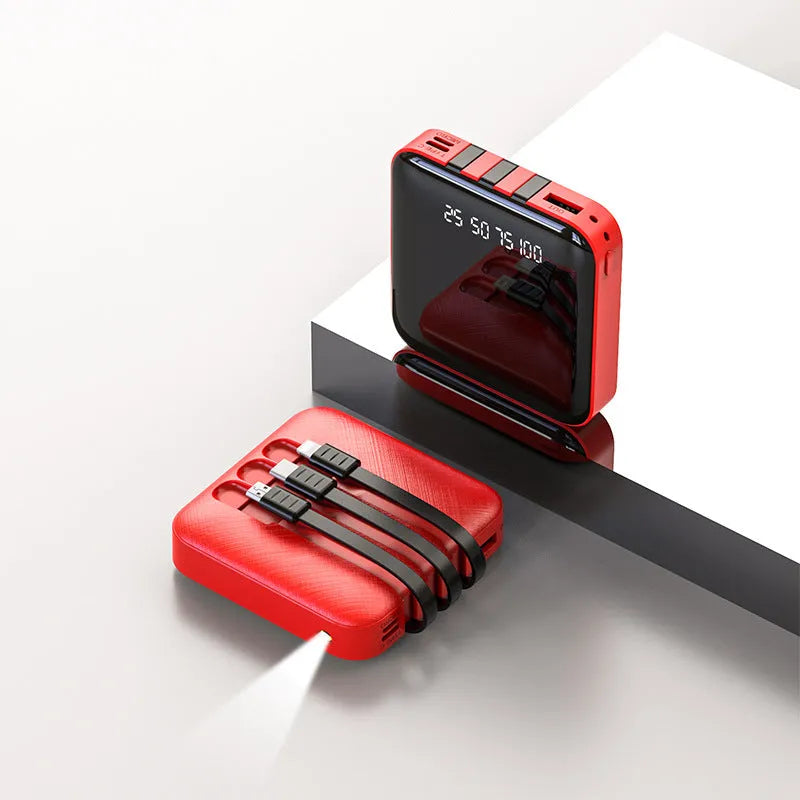 Square black or red power bank with a built-in charging cable protruding from the case.
