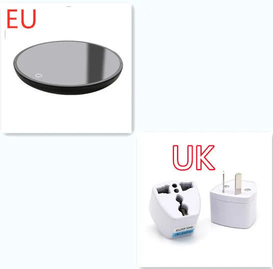 Black coffee mug warmer on a desk with low and high temperature switch