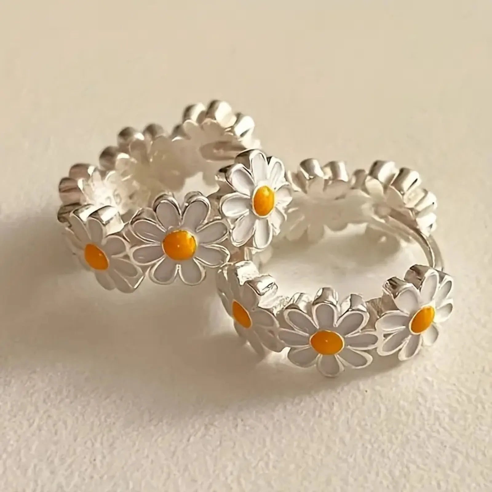 White daisy flower design ring earrings made from copper with an electroplated finish.