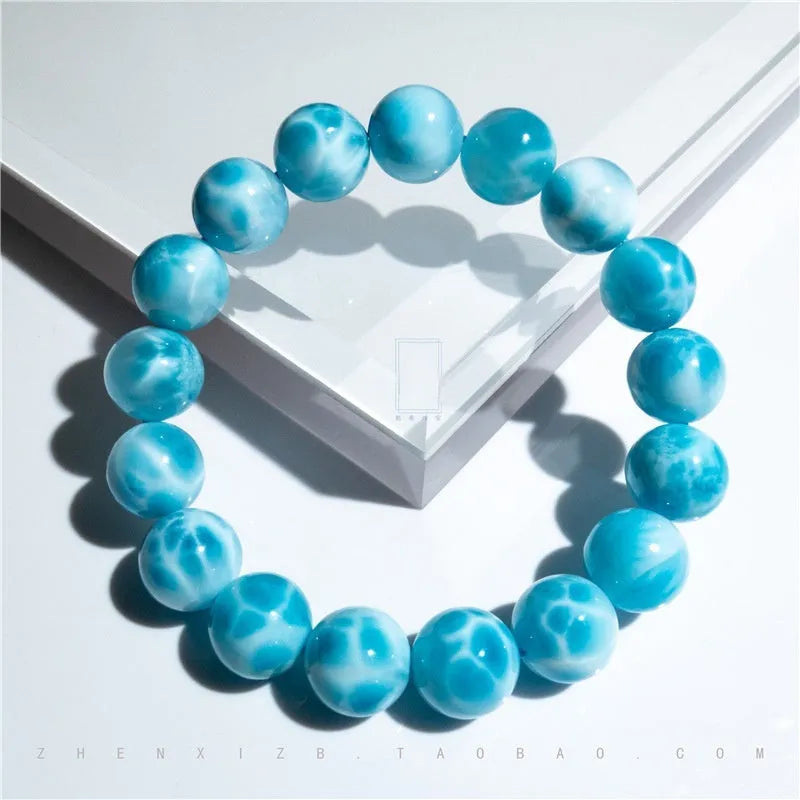 Blue natural crystal sea-pattern stone and Bodhi seed bracelet with pearl accents in Maillard style.