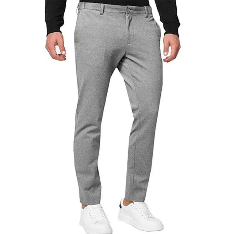 Men's slim-fit tapered chino trousers in cotton blend fabric with pleated front detail