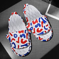 Cute shark design on light beige EVA open-toe home slippers for indoor wear.