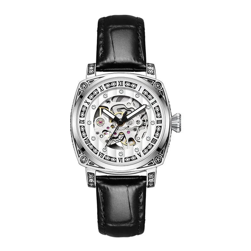 Mechanical watch with luminous hands and leather strap in choice of colours.