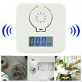 White wireless carbon monoxide alarm unit for wall mounting, detects CO gas from coal stoves.