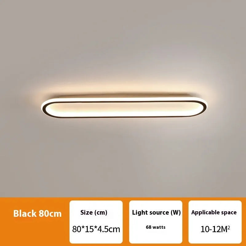 Minimalist black strip ceiling lamp with PVC shade mounted on a white ceiling