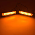 Yellow circular drag two middle net vehicle strobe warning light with 160mm diameter housing.