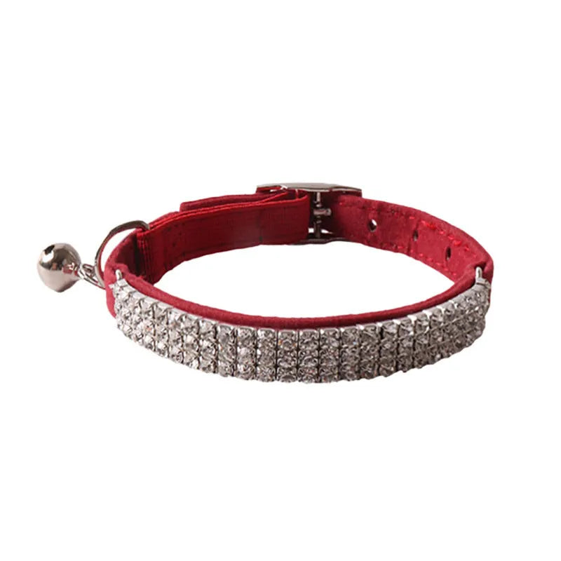 Elastic buckle cat collar in assorted colours with breakaway clasp, showing flocked material texture