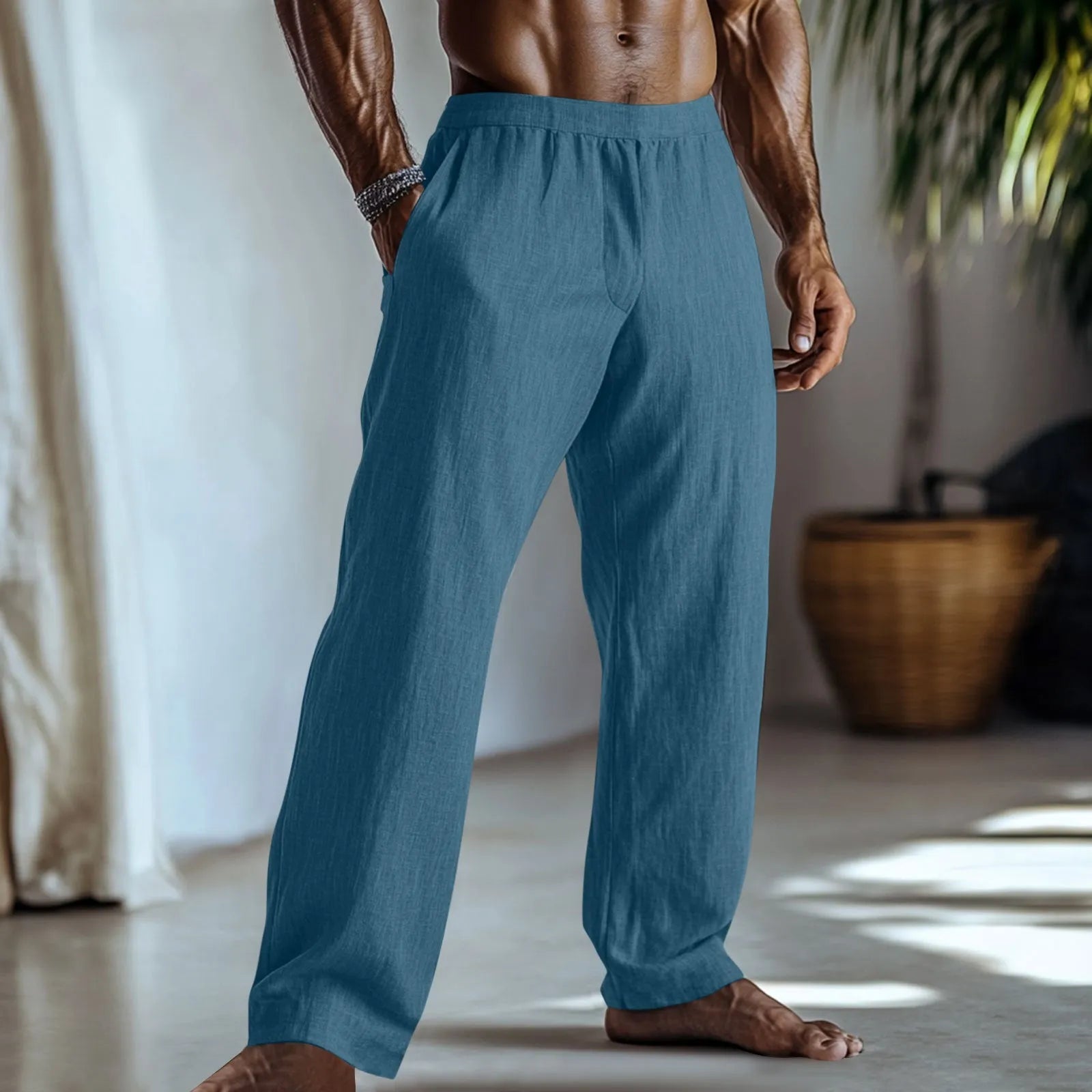 Straight-leg cotton linen trousers in light green shown front and back view