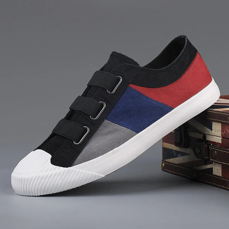 Men's canvas sneakers in multiple colours with elastic band closure and vulcanised rubber soles