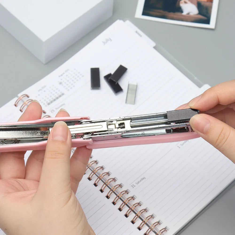 Open box showing 1000 metal staples in a choice of black, purple, rose gold, or rose red colours