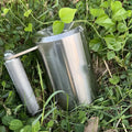 Silver stainless steel dumbbell cup weight plate showing 8kg cast iron construction