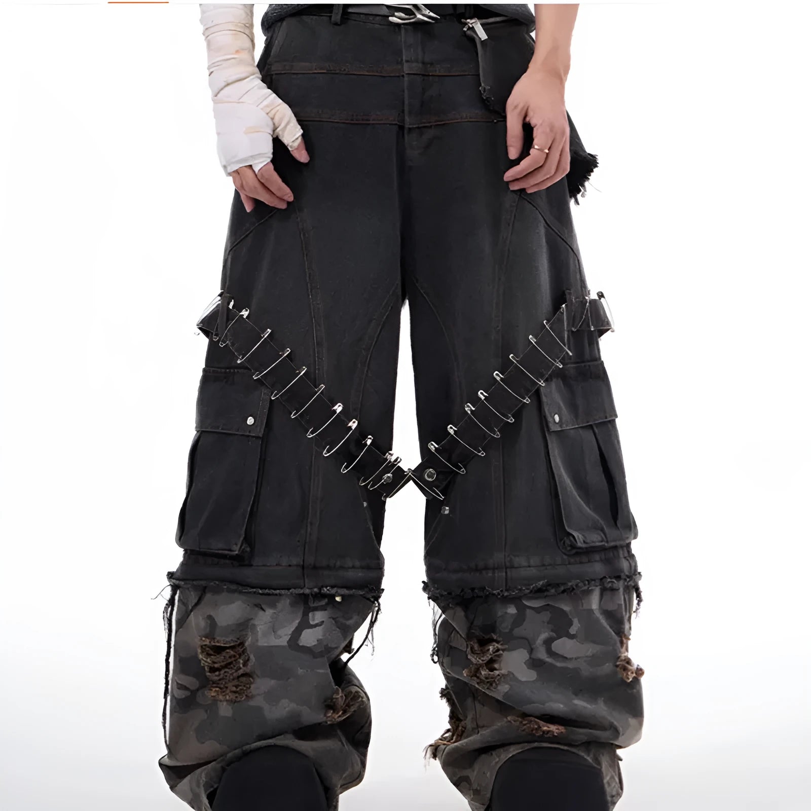 Men's grey cotton jeans with a camouflage splicing pattern, pin accents, and ribbon trim details.