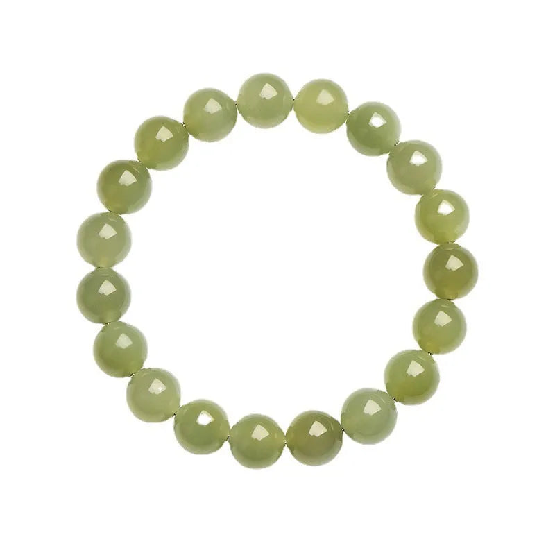 A polished Hetian jade bead bracelet in a light ice-clear colour, showing smooth round beads on a string.