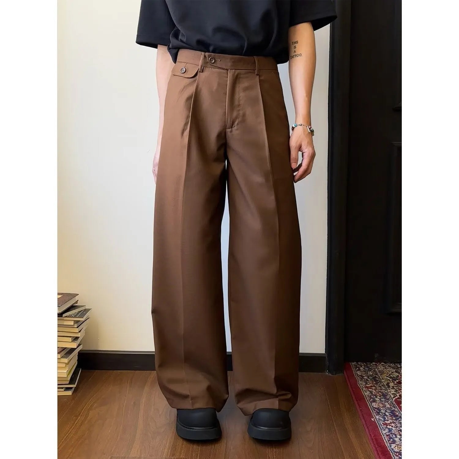 Men's brown straight-cut wide-leg casual suit trousers laid flat