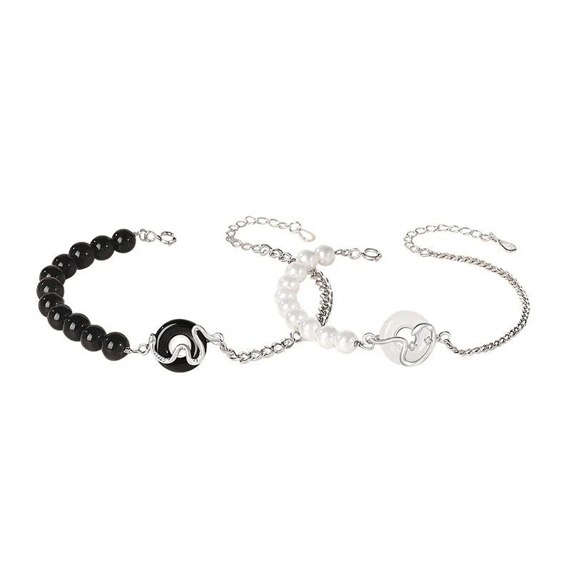 925 sterling silver couple bracelet with snake design and obsidian pearl accents on security buckle