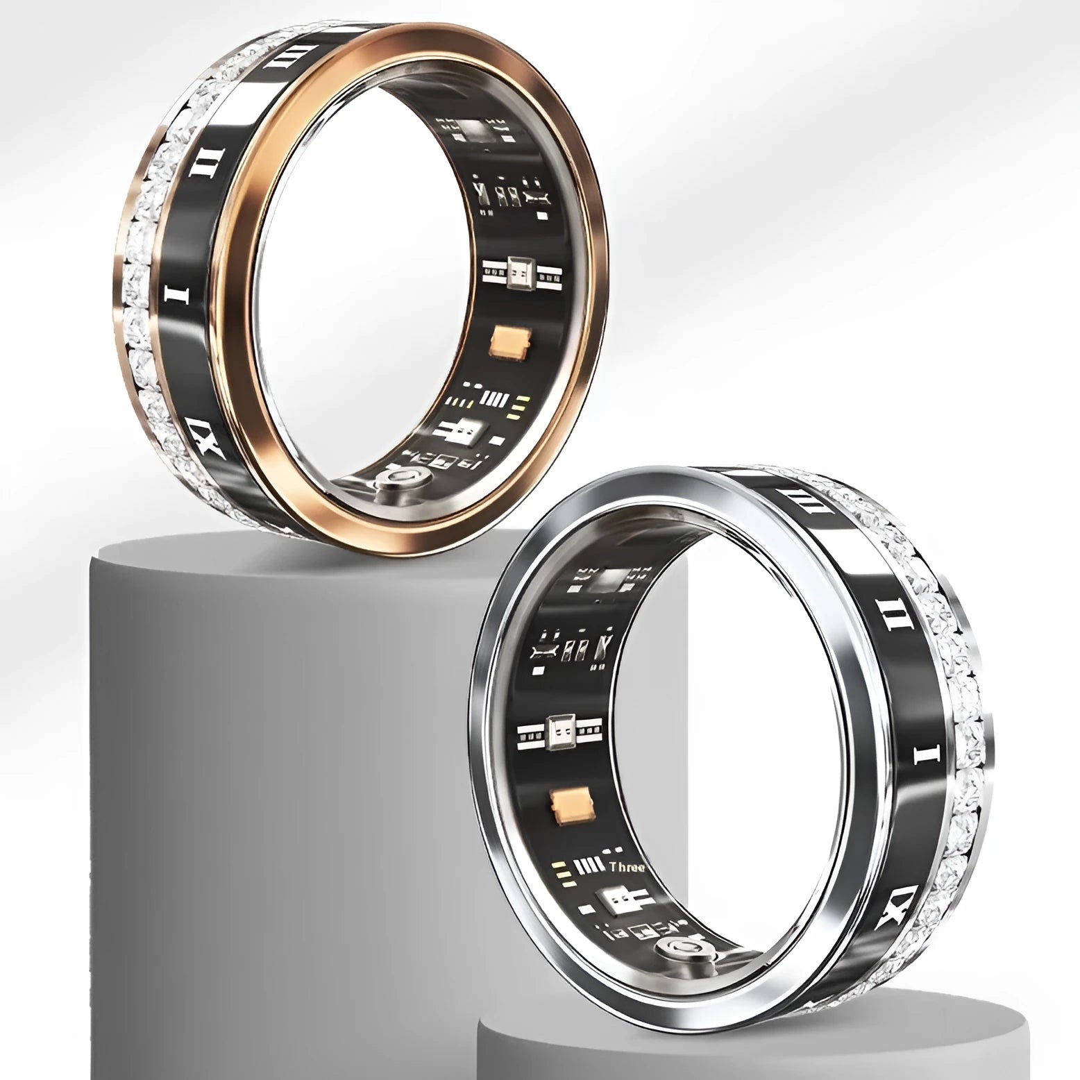 Silver and gold smart ring with diamond inlay showing blood oxygen monitoring technology