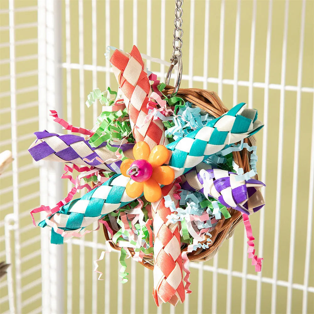 Parrot chewing toy with colourful plastic components and metal hanging chain for cage attachment