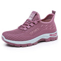 Men's and women's low-top casual sneakers with a round toe and soft PVC sole.