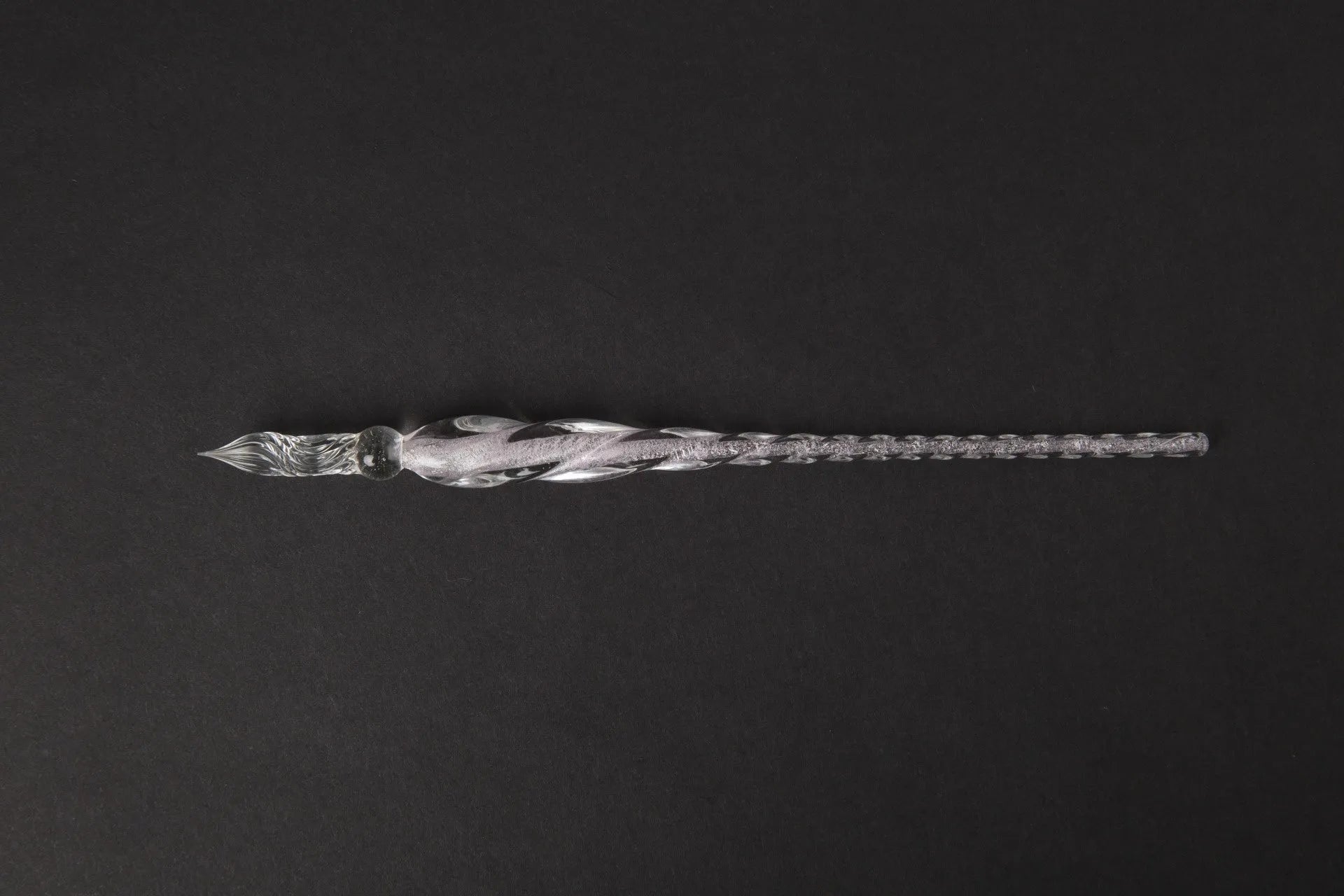 Transparent coloured glass crystal pen with water art ink in gift box, shown in multiple colour options.