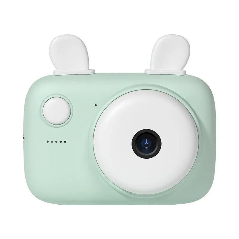 A2 Kids Macaron Mini SLR camera in green, pink, purple, or red with 2.4-inch screen, shown with lanyard.