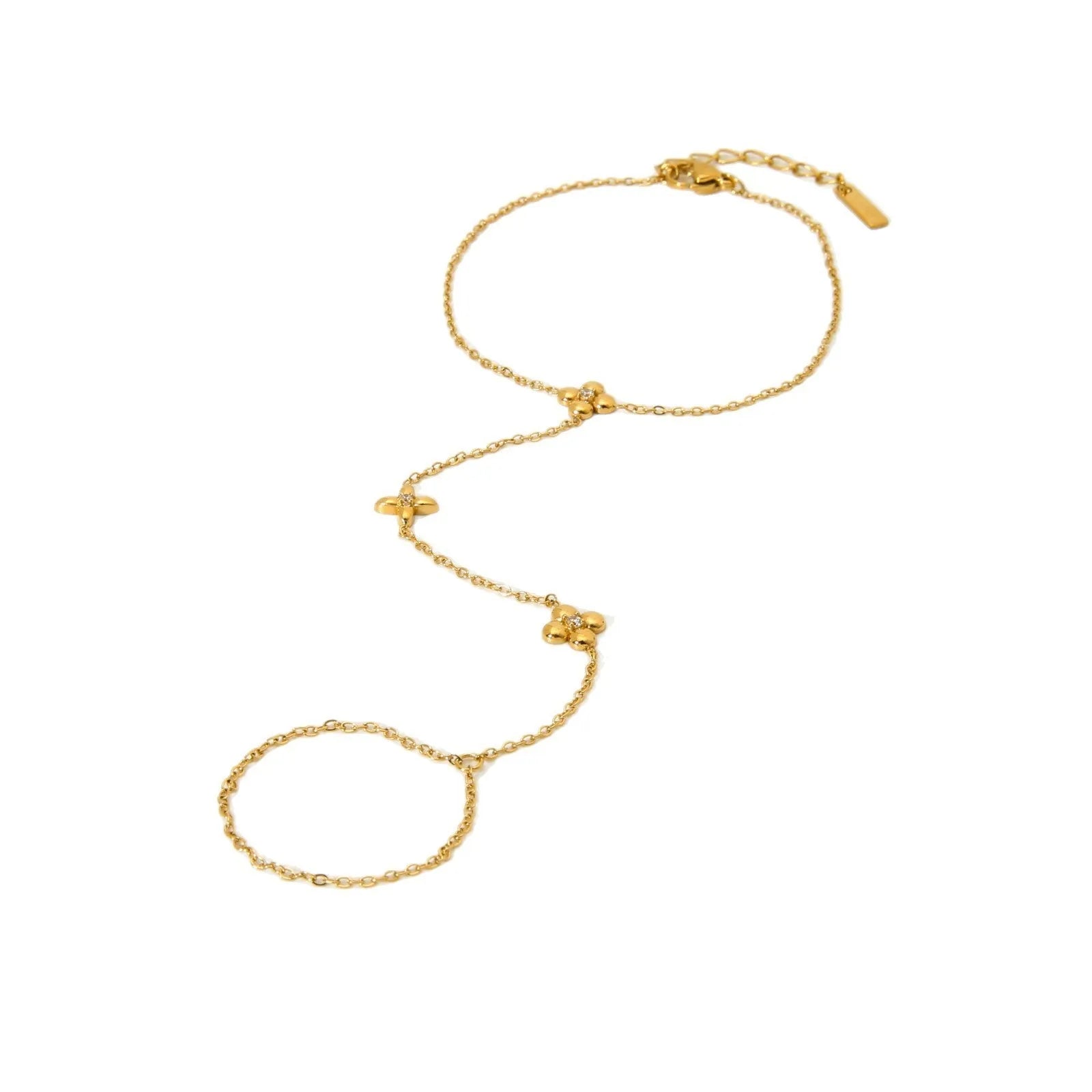 Gold stainless steel women's bracelet with geometric shape, flower and eight-pointed star details.