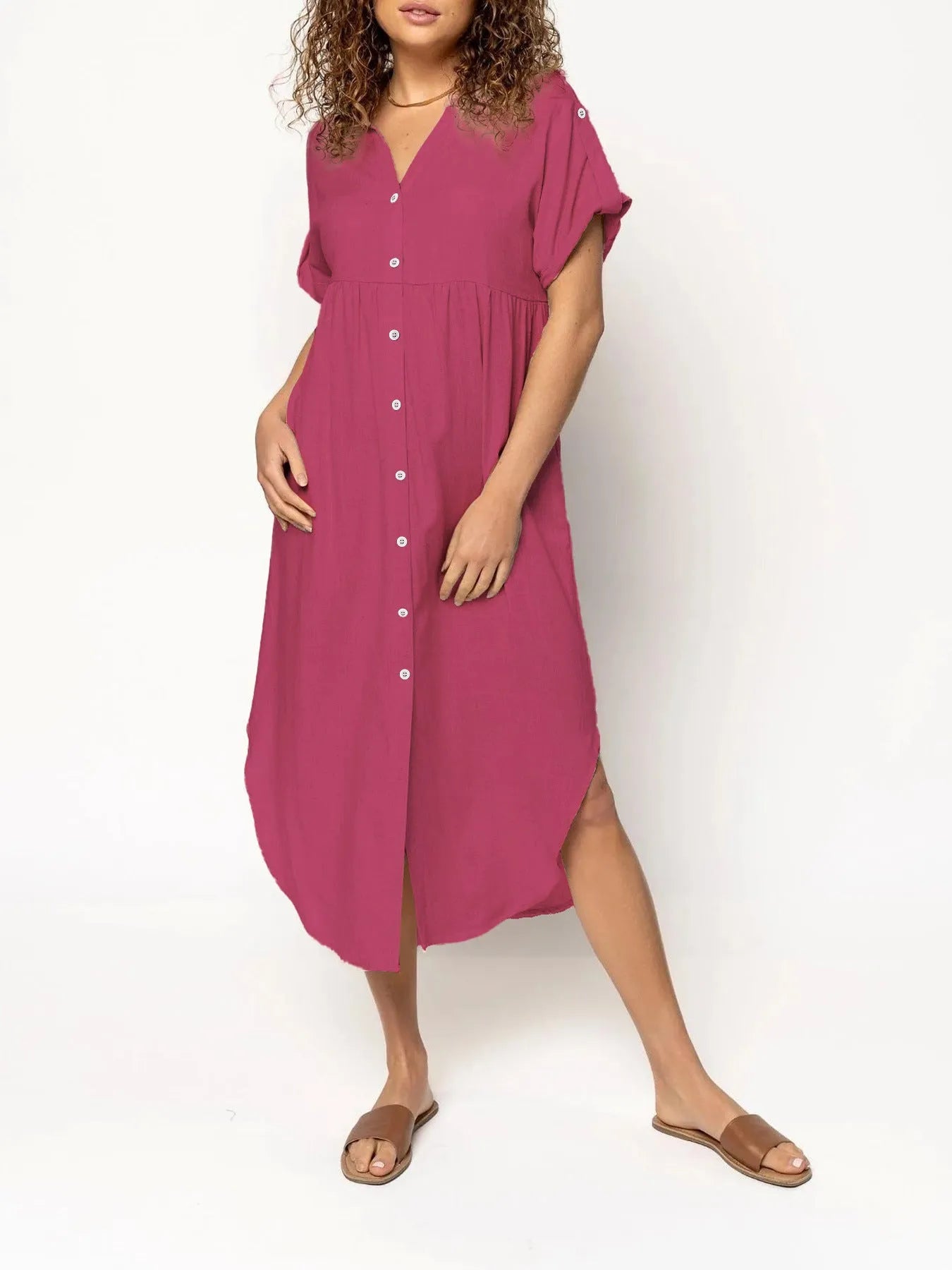 Women's loose-fit mid-length casual dress with button front in a solid colour.