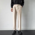 Men's apricot and black straight loose fit suit pants made from polyester fibre.